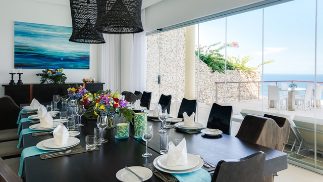 Grand Cliff Front Residence - Living room dinner table